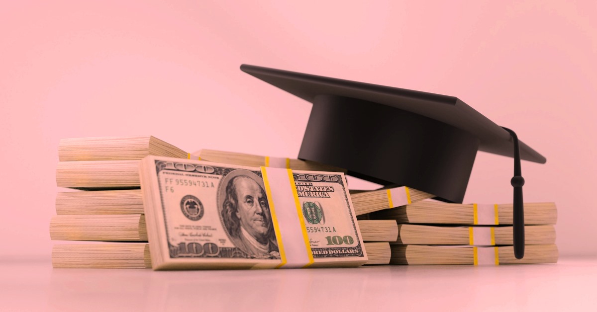 Mortar Board on a stack of money
