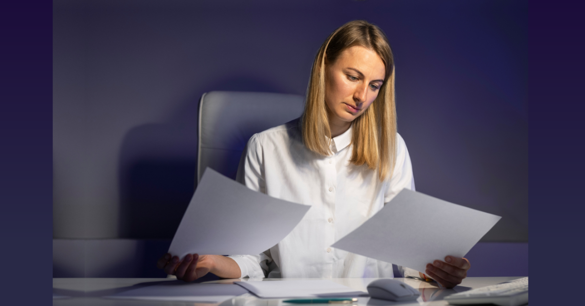 Woman Comparing Documents-1200×628-b Woman Comparing Documents 1200x628 b