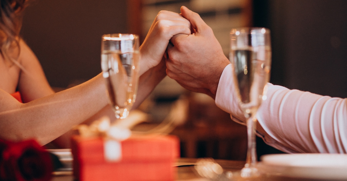 Valentine’s Couple engagement couple holding hands valentines 1200x628 1