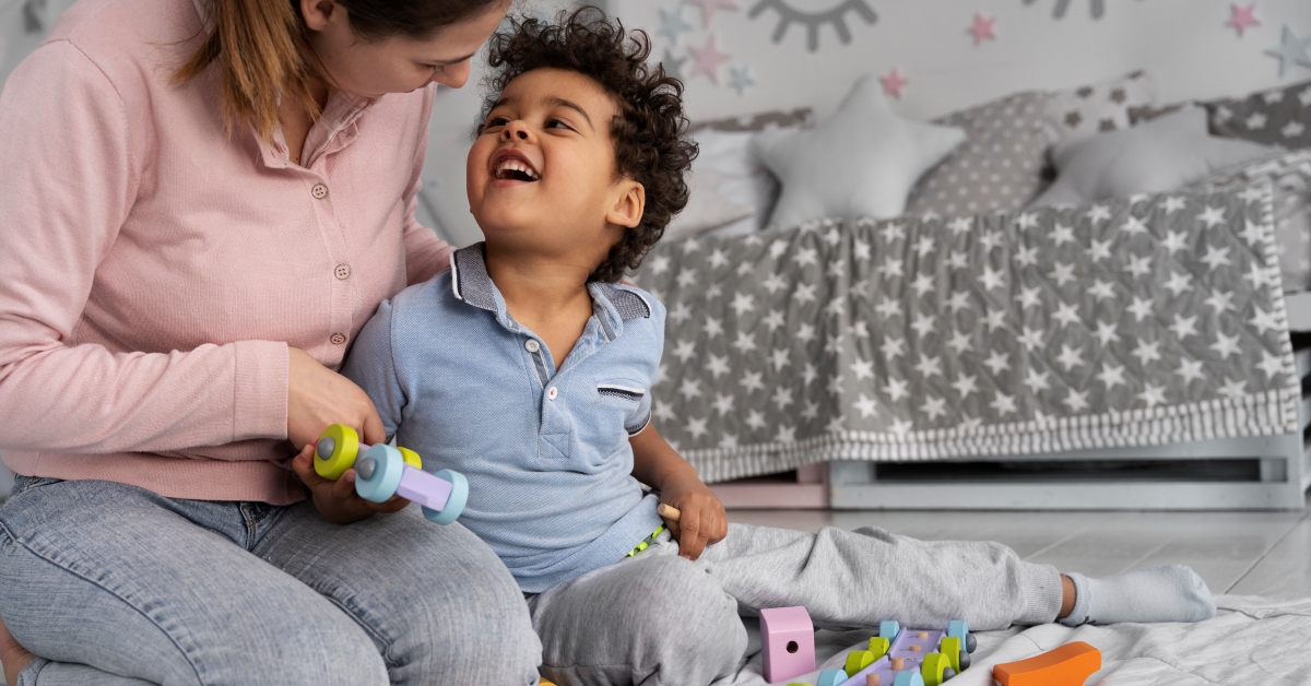 child enjoying didactic game 1200x628 b