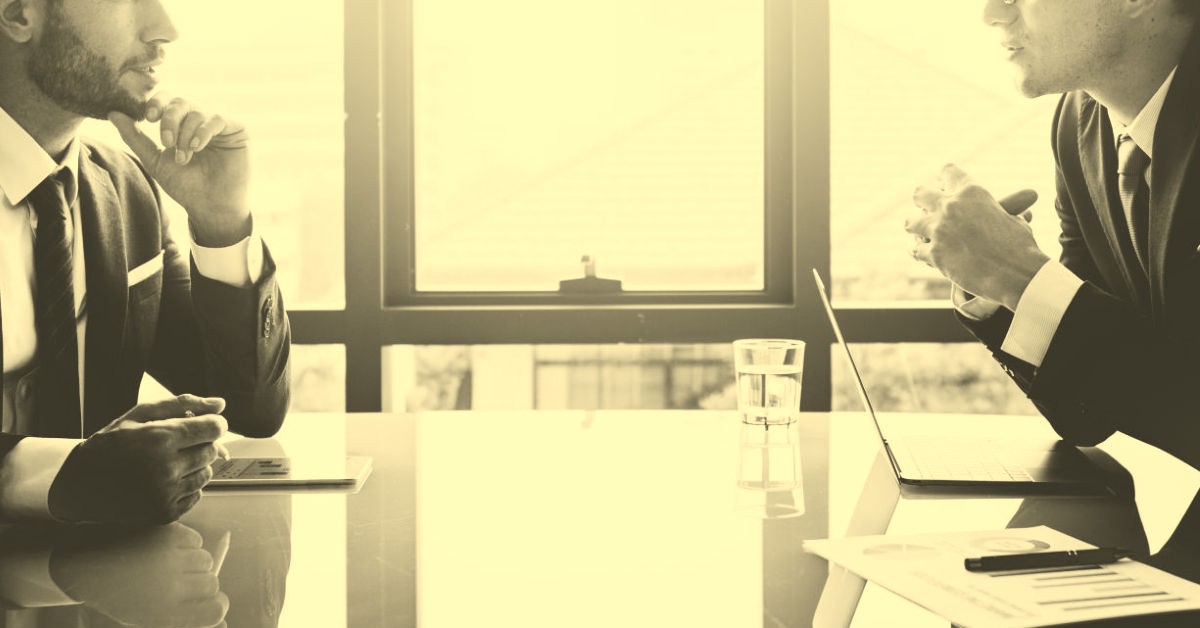 How to Structure a Deal and Avoid a Fraudulent Conveyance 2 businessman communication company meeting 1200x628 DRAFT 3 sepia