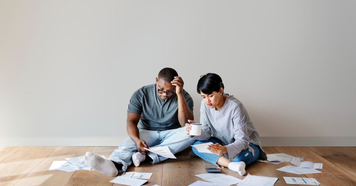 What Happens When You Die...With Multiple Copies of a Will? 2 couple dealing with paperwork freepik 1200x628 1